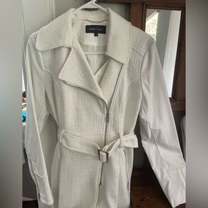 Ladies large three seasons coat. Faux leather sleeves and fabric body.